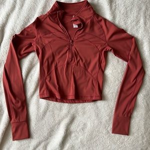 Orange cropped workout top